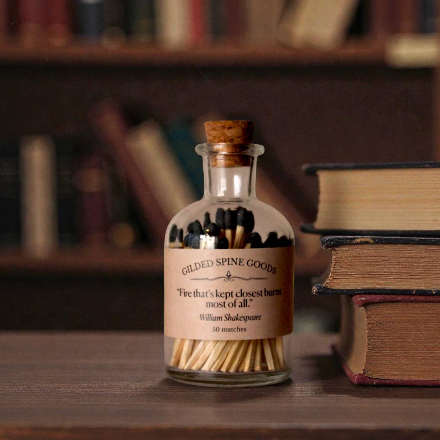 Literary Apothecary Match Bottle with Quote Label: "Fire that's kept closest burns most of all." - William Shakespeare