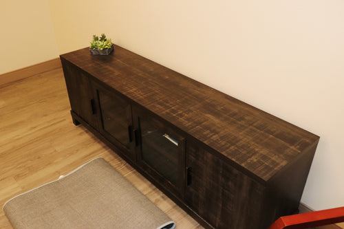 65" Media Console  Finish: Weathered Charcoal / Smoked Pine  ◦ Fits TVs up to 75" (Sturdy 135lb capacity)