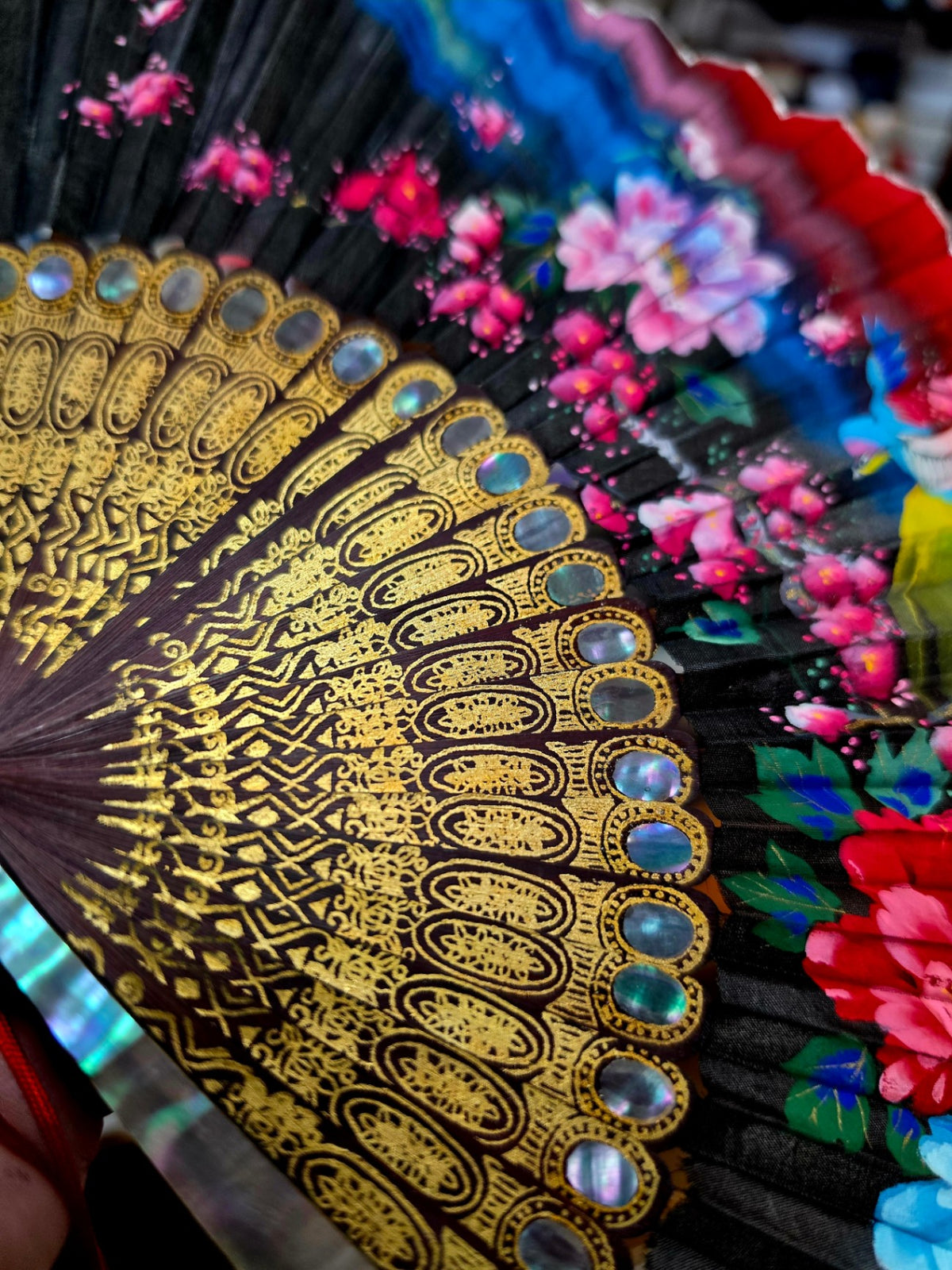 Vintage Mother-of-Pearl Hand-painted Mid Century Fan. In original box, accented in mother-of-Pearl and gold gilding with Premium  dark-stained wood staves