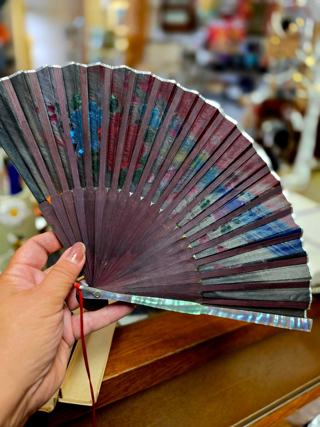 Vintage Mother-of-Pearl Hand-painted Mid Century Fan. In original box, accented in mother-of-Pearl and gold gilding with Premium  dark-stained wood staves