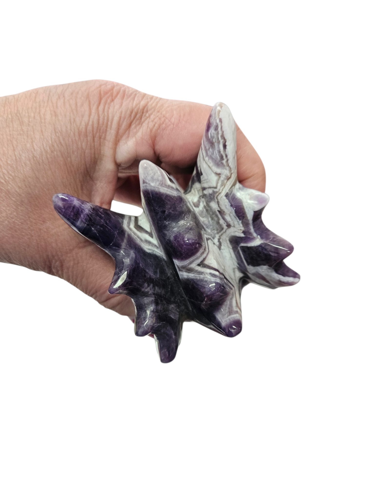 Hand-carved from a solid 1.22lb block of Dream Chevron Amethyst, this statement piece is a masterclass in nature's artistry.